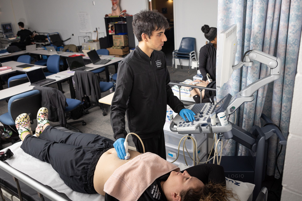 Student performing a sonograph